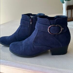 Navy blue suede-like shoe boots. Silver buckle accent with cross stitch on back